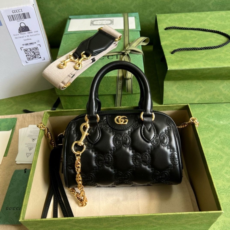 G*u*i top handle bags